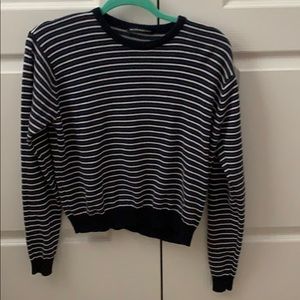 blue, white, and black sweater